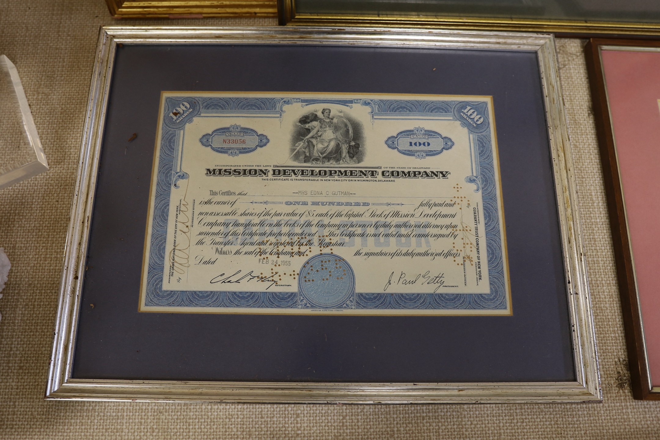 Four framed share certificates and two religious engravings